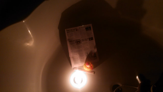 Bathtub close-up with tealight light inside
